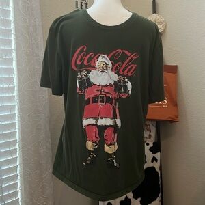 Men’s Lucky Brand, Coca-Cola Santa tee shirt. Green w/front graphic. Size LG